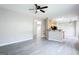 Open-concept living area with views to kitchen and ample space for entertaining at 2805 Topaz Rd, Riverdale, GA 30296