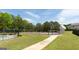 A community tennis court surrounded by trees, perfect for an active lifestyle at 2805 Topaz Rd, Riverdale, GA 30296