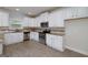 Well-lit kitchen with stainless steel appliances and granite countertops at 5016 Brass Ct # 195, Locust Grove, GA 30248