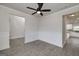 Spacious living room with panel moulding and adjacent kitchen at 5016 Brass Ct # 195, Locust Grove, GA 30248