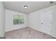 Bedroom featuring carpet flooring, one window, and a closet at 5016 Brass Ct, Locust Grove, GA 30248