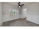 Well-lit dining area featuring large window, wainscoting, and stylish floors at 5016 Brass Ct, Locust Grove, GA 30248