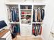 Walk-in closet with custom organizers, drawers, shelving, and hanging racks at 3180 Lee Dr, Buford, GA 30518