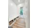 Mud room entry with built-in bench and storage with access to back porch at 3180 Lee Dr, Buford, GA 30518