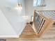Staircase with wood steps and modern railings leads up to the second floor at 3180 Lee Dr, Buford, GA 30518