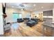 Spacious living room with a fireplace, comfortable seating, and ample natural light, perfect for Gathering gatherings at 227 Wet Wood Ct, Fairburn, GA 30213