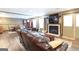 Finished basement with a fireplace, sitting area, and dark wood flooring at 150 Murphy Creek Ln, Fayetteville, GA 30215