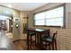 Basement with a small table and chairs beside the window and billiard cue rack at 150 Murphy Creek Ln, Fayetteville, GA 30215
