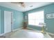 Bright bedroom featuring a ceiling fan, carpet, and a window at 150 Murphy Creek Ln, Fayetteville, GA 30215