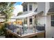 Deck with comfortable seating, a grill, and a retractable awning, perfect for outdoor entertaining and enjoying the scenery at 150 Murphy Creek Ln, Fayetteville, GA 30215