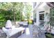 Inviting outdoor deck with comfortable seating and a peaceful, wooded view at 150 Murphy Creek Ln, Fayetteville, GA 30215