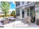 Outdoor deck area with patio furniture, plants, and exterior view of the home at 150 Murphy Creek Ln, Fayetteville, GA 30215