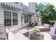 Expansive deck with plush seating, outdoor grill, and stylish awning for a comfortable outdoor experience at 150 Murphy Creek Ln, Fayetteville, GA 30215