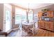 Charming dining room with plenty of natural light and wood flooring at 150 Murphy Creek Ln, Fayetteville, GA 30215