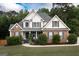 Beautiful two-story home featuring a brick and siding exterior, well-maintained landscaping, and a classic design at 150 Murphy Creek Ln, Fayetteville, GA 30215