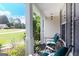 Cozy front porch setting with seating and a neighborhood view at 150 Murphy Creek Ln, Fayetteville, GA 30215