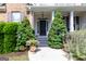 Home's entrance with charming details like a wreath and landscape at 150 Murphy Creek Ln, Fayetteville, GA 30215