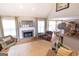 Bright living room features a fireplace, natural light, and an open layout at 150 Murphy Creek Ln, Fayetteville, GA 30215