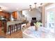 Open-concept design showcasing living room beyond the kitchen and dining areas at 150 Murphy Creek Ln, Fayetteville, GA 30215