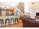 Inviting living room with hardwood floors, open floor plan and easy flow to kitchen at 150 Murphy Creek Ln, Fayetteville, GA 30215