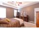 Spacious main bedroom has natural light and a four-poster bed at 150 Murphy Creek Ln, Fayetteville, GA 30215
