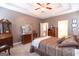 Comfortable main bedroom with carpet and a four-poster bed frame at 150 Murphy Creek Ln, Fayetteville, GA 30215