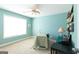 The office provides a ceiling fan and a large window providing abundant natural light at 150 Murphy Creek Ln, Fayetteville, GA 30215