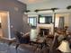 Inviting living room with a fireplace, offering a cozy atmosphere and modern decor, perfect for comfortable living at 565 Miles Ct, Locust Grove, GA 30248