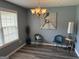 Cozy sitting area featuring stylish chairs, soft lighting, and decor, perfect for reading or relaxing in comfort at 565 Miles Ct, Locust Grove, GA 30248