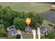 Aerial view of home with pool, lake, and golf course at 5028 Chapel Lake Cir, Douglasville, GA 30135