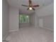 Bedroom featuring carpet flooring, a ceiling fan and natural light at 5028 Chapel Lake Cir, Douglasville, GA 30135