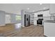 Open kitchen features stainless steel appliances and a breakfast bar at 2315 Shancey Ln, South Fulton, GA 30349
