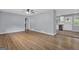 Bright and airy living room open to kitchen with stainless steel appliances at 2315 Shancey Ln, South Fulton, GA 30349