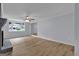 Bright living room with a large window, ceiling fan, and neutral paint at 2315 Shancey Ln, South Fulton, GA 30349