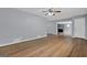 Open-concept living room features hardwood floors and a fireplace at 2315 Shancey Ln, South Fulton, GA 30349