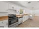 Functional kitchen with stainless steel appliances and wood-look countertops at 37 S Forty Pass W, Hiram, GA 30141