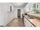 A different angle on the kitchen showing the vinyl flooring at 37 S Forty Pass W, Hiram, GA 30141