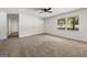 A second view of the living room showing the front door and lots of light at 37 S Forty Pass W, Hiram, GA 30141