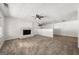 Bright living room with a cozy fireplace and neutral carpeting at 37 S Forty Pass W, Hiram, GA 30141