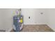 Utility room with newer hot water tank at 37 S Forty Pass W, Hiram, GA 30141