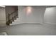 Finished basement with neutral carpet and white walls at 2329 Lochinver Sw Ln, Conyers, GA 30094