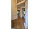 Spacious foyer featuring hardwood floors and classic architectural details at 2329 Lochinver Sw Ln, Conyers, GA 30094