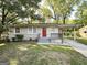 Inviting single-story home with carport, freshly painted and landscaped front lawn at 250 Glenrose Sw Cir, Atlanta, GA 30354