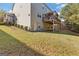 Backyard featuring a walkout basement and nice lawn at 3213 Blackley Old Rd, Douglasville, GA 30135