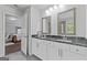 Elegant bathroom featuring dual sinks and lots of natural light at 3213 Blackley Old Rd, Douglasville, GA 30135