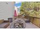 Inviting deck featuring a fire pit, comfortable seating, and outdoor lounging at 3213 Blackley Old Rd, Douglasville, GA 30135