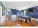 Spacious game room featuring a pool table and hardwood floors at 3213 Blackley Old Rd, Douglasville, GA 30135
