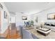 Bright living room featuring hardwood floors, wainscoting, and elegant decor at 3213 Blackley Old Rd, Douglasville, GA 30135