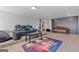 Spacious living room with plush seating and a movie themed rug at 3213 Blackley Old Rd, Douglasville, GA 30135