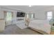 Serene main bedroom with a fireplace and lots of natural light at 3213 Blackley Old Rd, Douglasville, GA 30135